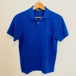 Polo by Ralph Lauren blue, medium, slim fit and well taken care of